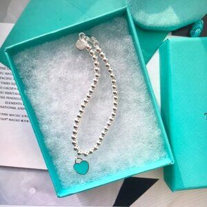 Silver and Blue Beaded Bracelet with Turquoise Accent